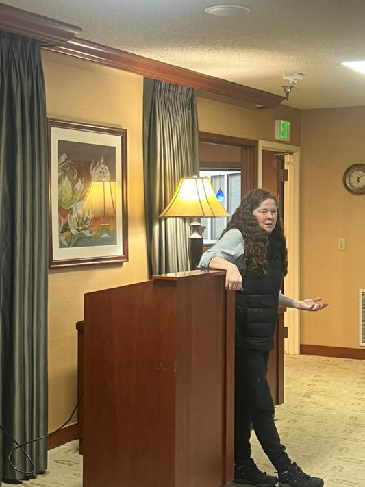 Katie Accola speaking to Sammamish Rotary about the Youth Empowerment Network